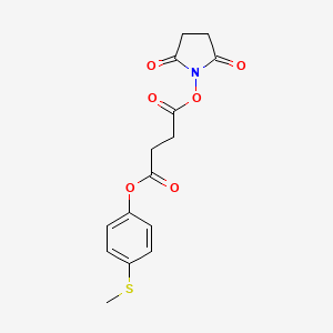 molecular formula C15H15NO6S B1199831 4-(Methylthio)phenyl 4-((2,5-dioxo-1-pyrrolidinyl)oxy)-4-oxobutanoate CAS No. 86451-38-9