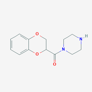 molecular formula C13H16N2O3 B120043 (2,3-Dihydrobenzo[b][1,4]dioxin-2-yl)(piperazin-1-yl)methanone CAS No. 70918-00-2