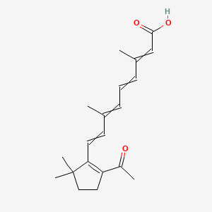molecular formula C20H26O3 B1203366 9-(2-Acetyl-5,5-dimethylcyclopenten-1-yl)-3,7-dimethylnona-2,4,6,8-tetraenoic acid 