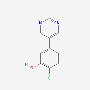 molecular formula C10H7ClN2O B12072843 2-Chloro-5-(pyrimidin-5-yl)phenol 