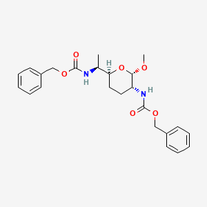 molecular formula C24H30N2O6 B1207640 Methyl 2,6-bis(benzyloxycarbonylamino)-2,3,4,6,7-pentadeoxy-beta-lyxo-heptopyranoside CAS No. 99239-15-3