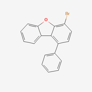 molecular formula C18H11BrO B12090597 Dibenzofuran, 4-bromo-1-phenyl- 