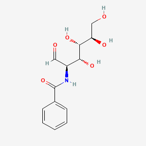 B1209402 N-((2R,3R,4S,5R)-3,4,5,6-Tetrahydroxy-1-oxohexan-2-yl)benzamide CAS No. 655-42-5