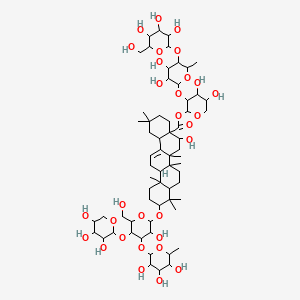 molecular formula C64H104O30 B1209922 [3-[3,4-Dihydroxy-6-methyl-5-[3,4,5-trihydroxy-6-(hydroxymethyl)oxan-2-yl]oxyoxan-2-yl]oxy-4,5-dihydroxyoxan-2-yl] 5-hydroxy-10-[3-hydroxy-6-(hydroxymethyl)-4-(3,4,5-trihydroxy-6-methyloxan-2-yl)oxy-5-(3,4,5-trihydroxyoxan-2-yl)oxyoxan-2-yl]oxy-2,2,6a,6b,9,9,12a-heptamethyl-1,3,4,5,6,6a,7,8,8a,10,11,12,13,14b-tetradecahydropicene-4a-carboxylate CAS No. 139077-64-8