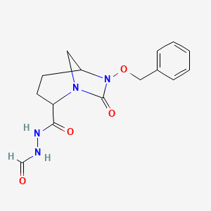 molecular formula C15H18N4O4 B12104718 N-[(7-oxo-6-phenylmethoxy-1,6-diazabicyclo[3.2.1]octane-2-carbonyl)amino]formamide 