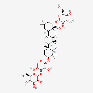molecular formula C47H76O17 B1213264 [(2S,3R,4S,5S,6R)-3,4,5-trihydroxy-6-(hydroxymethyl)oxan-2-yl] (4aS,6aR,6aS,6bR,10S,12aR,14bR)-10-[(2S,3R,4S,5S)-3,5-dihydroxy-4-[(2R,3R,4S,5S,6R)-3,4,5-trihydroxy-6-(hydroxymethyl)oxan-2-yl]oxyoxan-2-yl]oxy-2,2,6a,6b,9,9,12a-heptamethyl-1,3,4,5,6,6a,7,8,8a,10,11,12,13,14b-tetradecahydropicene-4a-carboxylate CAS No. 101021-02-7