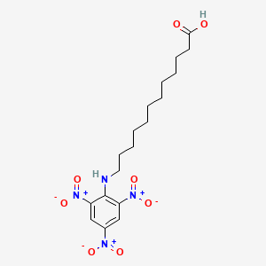 molecular formula C18H26N4O8 B1213792 Trinitrophenylaminolauric acid CAS No. 69020-46-8