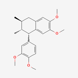 molecular formula C22H28O4 B1214359 Naphthalene,1-(3,4-dimethoxyphenyl)-1,2,3,4- tetrahydro-6,7-dimethoxy-2,3-dimethyl-,(1S,2R,3S)- CAS No. 521-55-1