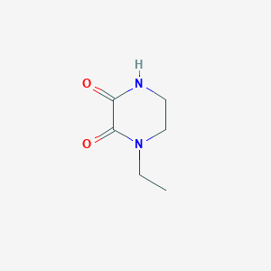 molecular formula C6H10N2O2 B121611 1-Ethylpiperazine-2,3-dione CAS No. 59702-31-7