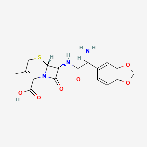 molecular formula C17H17N3O6S B1216387 (6R,7R)-7-[[2-amino-2-(1,3-benzodioxol-5-yl)acetyl]amino]-3-methyl-8-oxo-5-thia-1-azabicyclo[4.2.0]oct-2-ene-2-carboxylic acid CAS No. 55390-45-9