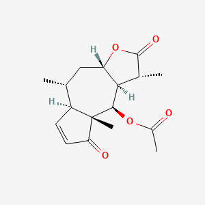 molecular formula C17H22O5 B1216490 [(1R,3aS,5R,5aR,8aR,9R,9aR)-1,5,8a-trimethyl-2,8-dioxo-3a,4,5,5a,9,9a-hexahydro-1H-azuleno[6,5-b]furan-9-yl] acetate 