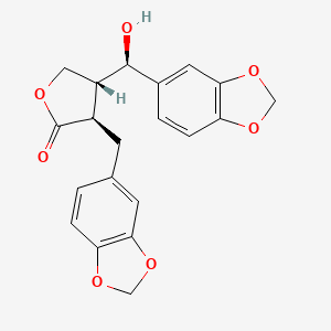 molecular formula C20H18O7 B1217132 Parabenzlactone CAS No. 27675-77-0