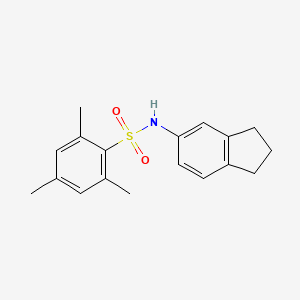 molecular formula C18H21NO2S B12172520 Indan-5-yl[(2,4,6-trimethylphenyl)sulfonyl]amine 