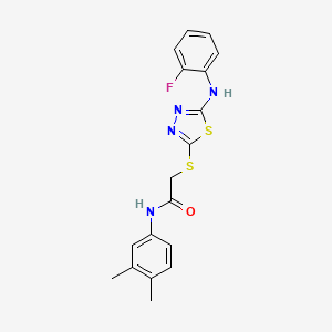 molecular formula C18H17FN4OS2 B12188143 N-(3,4-dimethylphenyl)-2-({5-[(2-fluorophenyl)amino]-1,3,4-thiadiazol-2-yl}sulfanyl)acetamide 