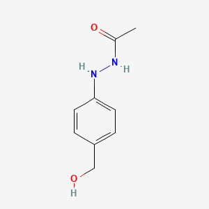 molecular formula C9H12N2O2 B1220458 N'-Acetyl-4-(hydroxymethyl)phenylhydrazine CAS No. 65734-38-5