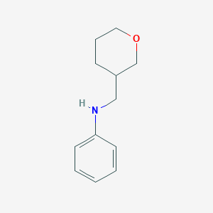molecular formula C12H17NO B12234753 N-[(oxan-3-yl)methyl]aniline 