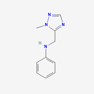 molecular formula C10H12N4 B12239272 N-[(1-methyl-1H-1,2,4-triazol-5-yl)methyl]aniline 