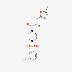 (E)-1-[4-(3,4-dimethylphenyl)sulfonylpiperazin-1-yl]-3-(5-methylfuran-2-yl)prop-2-en-1-one