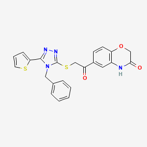 molecular formula C23H18N4O3S2 B1225006 6-[1-oxo-2-[[4-(phenylmethyl)-5-thiophen-2-yl-1,2,4-triazol-3-yl]thio]ethyl]-4H-1,4-benzoxazin-3-one 