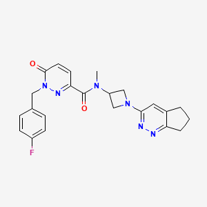 molecular formula C23H23FN6O2 B12250539 N-(1-{5H,6H,7H-cyclopenta[c]pyridazin-3-yl}azetidin-3-yl)-1-[(4-fluorophenyl)methyl]-N-methyl-6-oxo-1,6-dihydropyridazine-3-carboxamide 