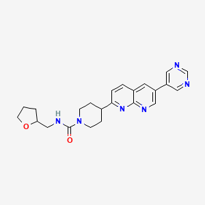 molecular formula C23H26N6O2 B12252020 N-[(oxolan-2-yl)methyl]-4-[6-(pyrimidin-5-yl)-1,8-naphthyridin-2-yl]piperidine-1-carboxamide 