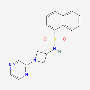 molecular formula C17H16N4O2S B12254513 N-[1-(pyrazin-2-yl)azetidin-3-yl]naphthalene-1-sulfonamide 