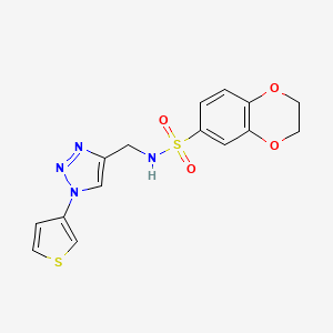 molecular formula C15H14N4O4S2 B12255420 N-((1-(thiophen-3-yl)-1H-1,2,3-triazol-4-yl)methyl)-2,3-dihydrobenzo[b][1,4]dioxine-6-sulfonamide 