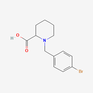 molecular formula C13H16BrNO2 B12272728 1-(4-Bromobenzyl)-2-carboxypiperidine 