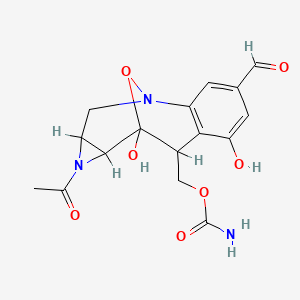 3,9-Epoxy-3H-azirino(2,3-c)(1)benzazocine-5-carboxaldehyde, 1-acetyl-8-(((aminocarbonyl)oxy)methyl)-1,1a,2,8,9,9a-hexahydro-7,9-dihydroxy-