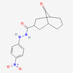 molecular formula C16H19N3O4 B1228689 N'-(4-nitrophenyl)-9-oxobicyclo[3.3.1]nonane-3-carbohydrazide 