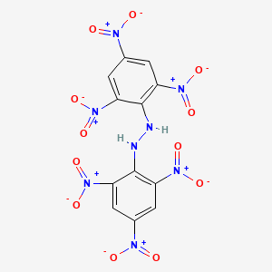 B1228774 Hydrazine, 1,2-bis(2,4,6-trinitrophenyl)- CAS No. 68683-32-9