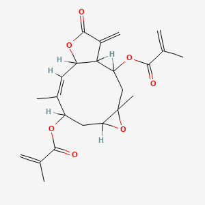 molecular formula C23H28O7 B1231608 [(9Z)-4,9-dimethyl-14-methylidene-2-(2-methylprop-2-enoyloxy)-13-oxo-5,12-dioxatricyclo[9.3.0.04,6]tetradec-9-en-8-yl] 2-methylprop-2-enoate CAS No. 50816-66-5