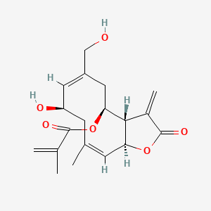 molecular formula C19H24O6 B1232681 [(3aS,4S,6E,8R,10Z,11aS)-8-hydroxy-6-(hydroxymethyl)-10-methyl-3-methylidene-2-oxo-3a,4,5,8,9,11a-hexahydrocyclodeca[b]furan-4-yl] 2-methylprop-2-enoate CAS No. 65388-18-3
