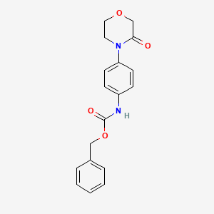 molecular formula C18H18N2O4 B12327064 Benzyl (4-(3-oxomorpholino)phenyl)carbamate 