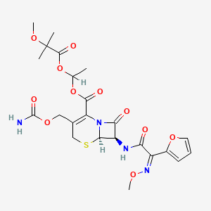 molecular formula C23H28N4O11S B1233499 1-(2-methoxy-2-methylpropanoyl)oxyethyl (6R,7R)-3-(carbamoyloxymethyl)-7-[[(2Z)-2-(furan-2-yl)-2-methoxyiminoacetyl]amino]-8-oxo-5-thia-1-azabicyclo[4.2.0]oct-2-ene-2-carboxylate CAS No. 100680-33-9