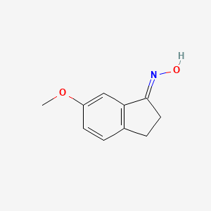 molecular formula C10H11NO2 B12342495 Oxime-2,3-dihydro-6-methoxy-1H-inden-1-one 
