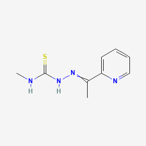 molecular formula C9H12N4S B1235408 3-Methyl-1-{[1-(pyridin-2-yl)ethylidene]amino}thiourea CAS No. 75013-64-8