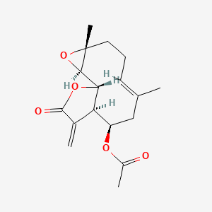 molecular formula C17H22O5 B1235653 [(1S,2R,4R,7E,10R,11R)-4,8-dimethyl-12-methylidene-13-oxo-3,14-dioxatricyclo[9.3.0.02,4]tetradec-7-en-10-yl] acetate 