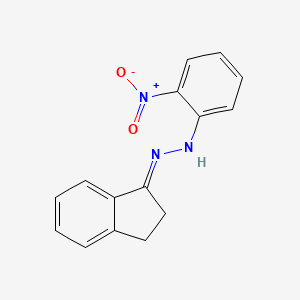 molecular formula C15H13N3O2 B1241351 N-[(E)-2,3-dihydroinden-1-ylideneamino]-2-nitroaniline 