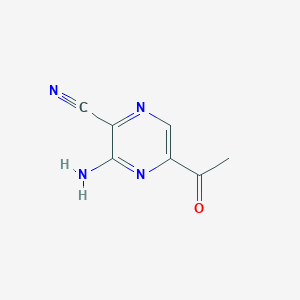 molecular formula C7H6N4O B124184 5-Acetyl-3-aminopyrazine-2-carbonitrile CAS No. 147425-71-6