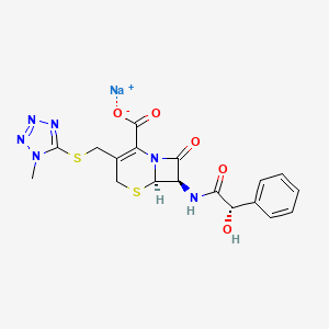 molecular formula C18H17N6NaO5S2 B12439241 Sodium (6R,7R)-7-[(2S)-2-hydroxy-2-phenylacetamido]-3-{[(1-methyl-1,2,3,4-tetrazol-5-YL)sulfanyl]methyl}-8-oxo-5-thia-1-azabicyclo[4.2.0]oct-2-ene-2-carboxylate 