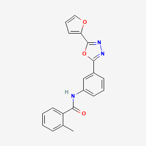 molecular formula C20H15N3O3 B12448775 N-{3-[5-(furan-2-yl)-1,3,4-oxadiazol-2-yl]phenyl}-2-methylbenzamide 