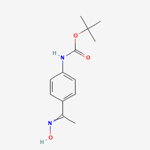 molecular formula C13H18N2O3 B12454330 [4-(1-Hydroxyimino-ethyl)-phenyl]-carbamic acid tert-butyl ester 