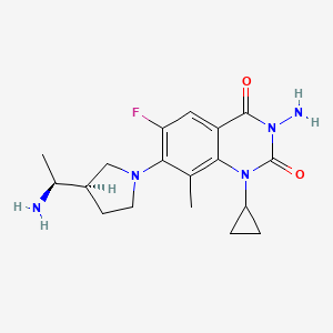 B1247039 3-Amino-7-{(3r)-3-[(1s)-1-Aminoethyl]pyrrolidin-1-Yl}-1-Cyclopropyl-6-Fluoro-8-Methylquinazoline-2,4(1h,3h)-Dione CAS No. 351372-19-5
