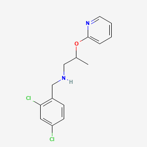 molecular formula C15H16Cl2N2O B12486726 N-(2,4-dichlorobenzyl)-2-(pyridin-2-yloxy)propan-1-amine 