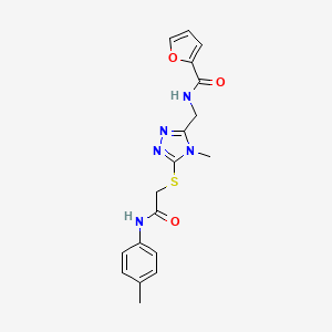 molecular formula C18H19N5O3S B12501877 N-{[4-methyl-5-({2-[(4-methylphenyl)amino]-2-oxoethyl}sulfanyl)-4H-1,2,4-triazol-3-yl]methyl}furan-2-carboxamide 
