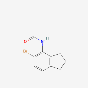 molecular formula C14H18BrNO B12504722 N-(5-Bromo-2,3-dihydro-1H-inden-4-yl)pivalamide 