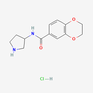 molecular formula C13H17ClN2O3 B12504798 N-(pyrrolidin-3-yl)-2,3-dihydrobenzo[b][1,4]dioxine-6-carboxamide hydrochloride 