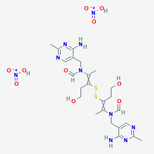 molecular formula C24H34N8O4S2.2HNO3<br>C24H36N10O10S2 B12505847 N-[(4-amino-2-methylpyrimidin-5-yl)methyl]-N-[3-[[2-[(4-amino-2-methylpyrimidin-5-yl)methyl-formylamino]-5-hydroxypent-2-en-3-yl]disulfanyl]-5-hydroxypent-2-en-2-yl]formamide;nitric acid CAS No. 109125-52-2