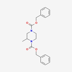 molecular formula C21H24N2O4 B12512058 Dibenzyl 2-methylpiperazine-1,4-dicarboxylate CAS No. 671198-52-0